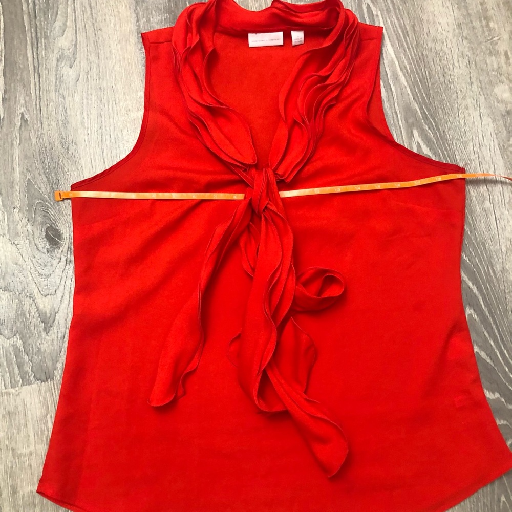 Red sleeveless blouse